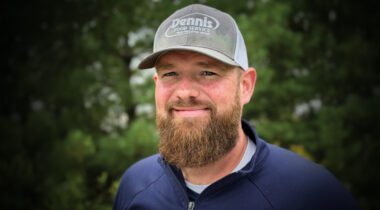 smiling white male wearing baseball cap