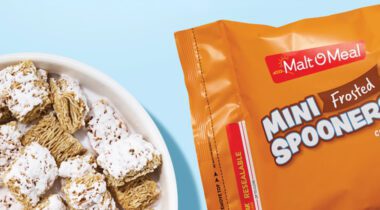 bowl of shredded wheat cereal next to Malt o Meal Mini Frosted Spooners Cereal