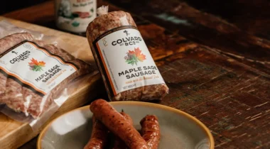sausage in packages, raw links and ground, and on plate cooked links banner image